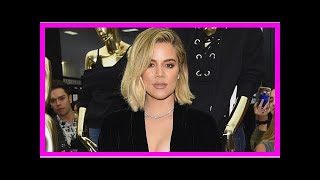 Khloe Kardashian Cradles Baby Bump While Rocking Stunning Sparkly Mini-Dress in Tokyo
