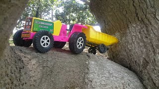 playing with toys on tree||racing tpys on tree||kids playing with toys||mini jeep toys