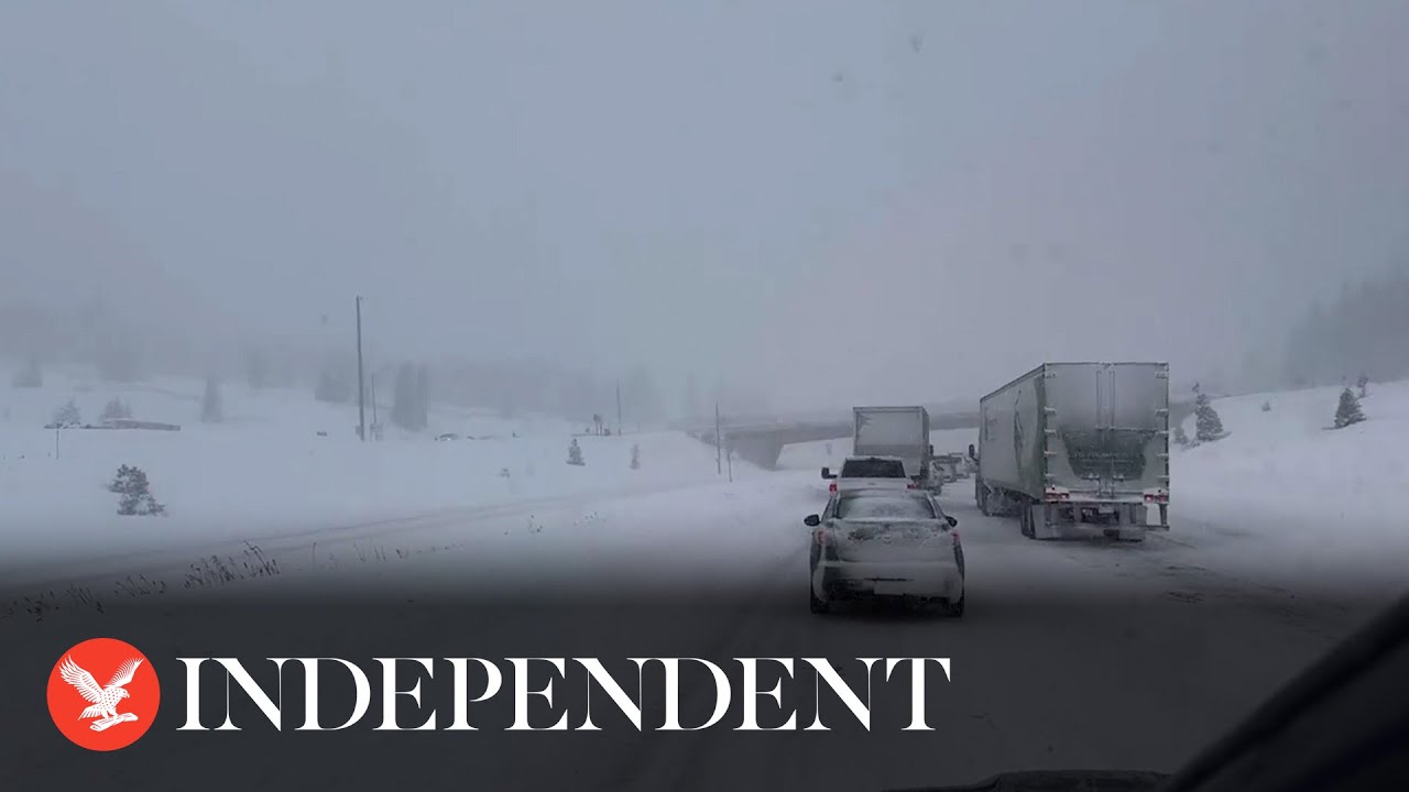 Traffic queues as heavy snowstorm hits Colorado’s mountain roads