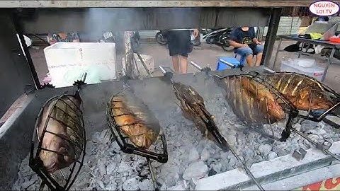 EM GÁI XINH ĐẢM ĐANG BÁN CÁ RÔ PHI NƯỚNG RIỀNG  MIỄN PHÍ SÍP CHO KHÁCH