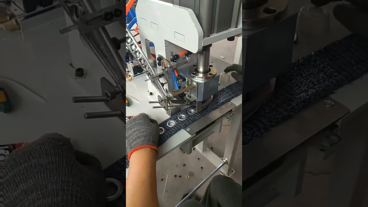 automatic eyelet machine
