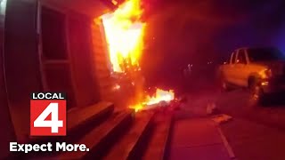 Bodycam video shows officers rescuing 8 from burning Farmington Hills home