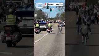 Ride-Along?! Louisiana Boy Cruises Alongside Cop in Mardi Gras Parade