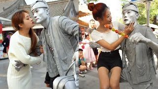 The Beauty Sat On Me To Eat Candied Haws 😂#silverman #silver #statue #funny #performance #viral