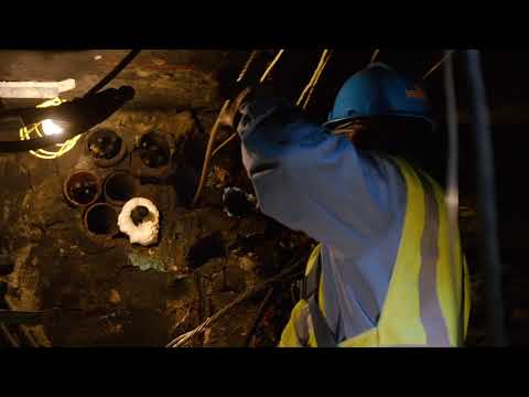 Con Edison Crew Working Underground in a NYC Manhole