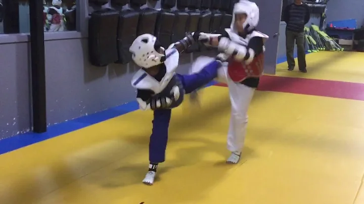 shanjit vs heavy weight competitor in TKD sparring