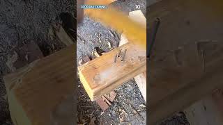 A smart way to hammer nails into a block of wood with a hammer #shorts