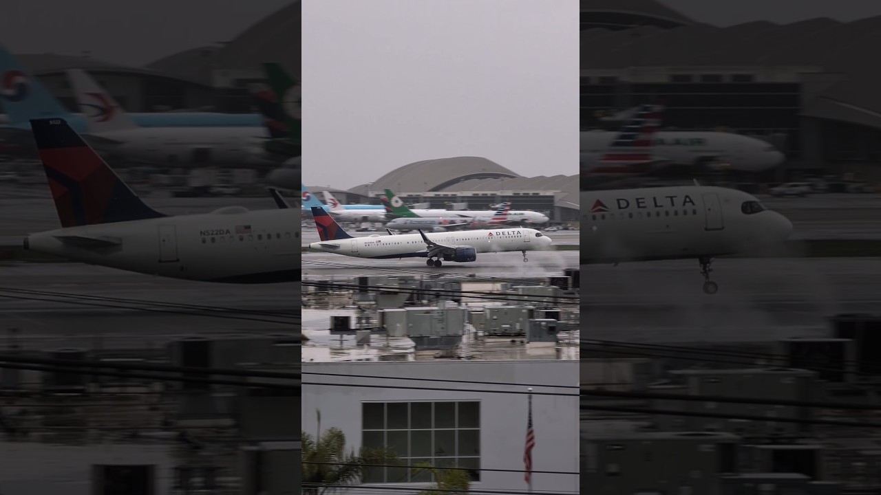 planespotting heavy rain landing Delta Air Lines Airbus A321-271  N522DA 
