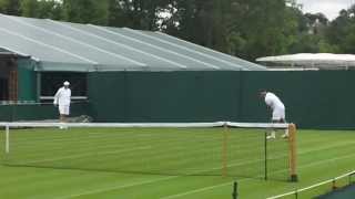 Roger Federer and Andy Murray in practice at Wimbledon