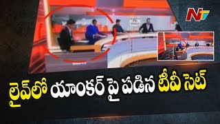Lucky Escape For TV Anchor As Part Of Set Falls On Him | Viral Video | NTV