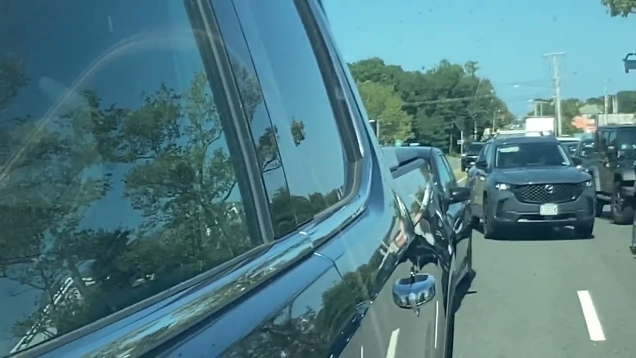 Barnstable PD car responding in heavy traffic in Hyannis 