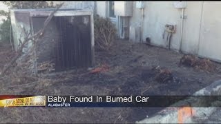 Infant remains found in burning car, woman charged with reckless murder