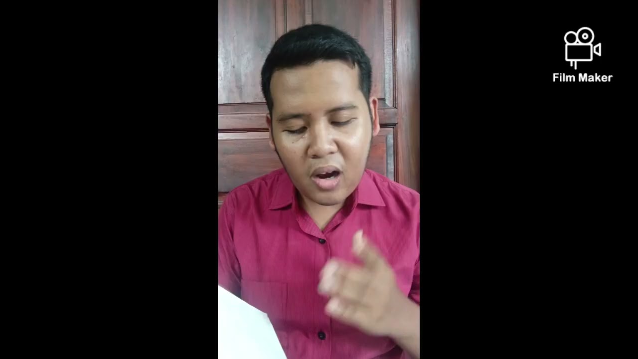Membaca Kitab Kejadian 1:1-10 menggunakan Bahasa Ibrani .