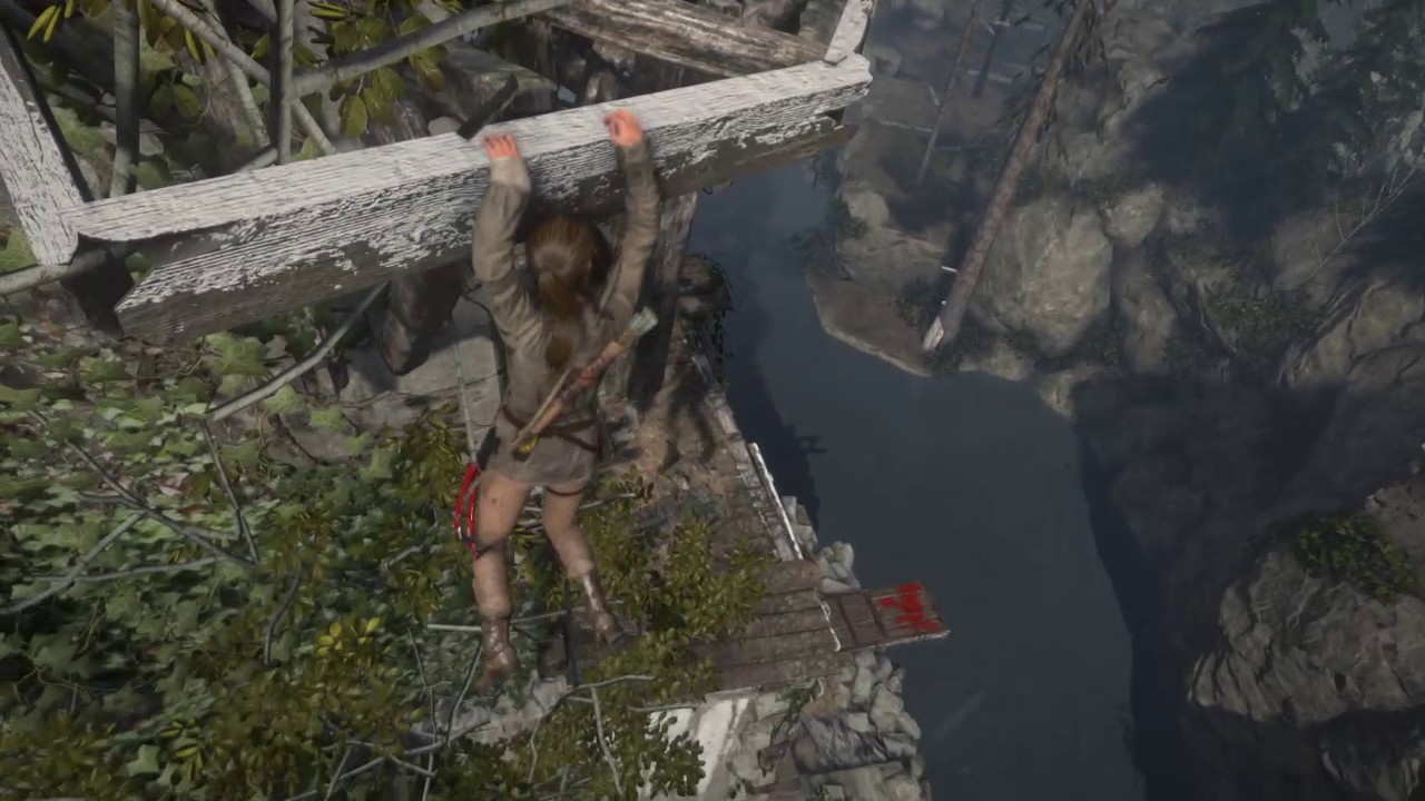 Rise of the Tomb Raider Climbing the cliff wall to reach the top of