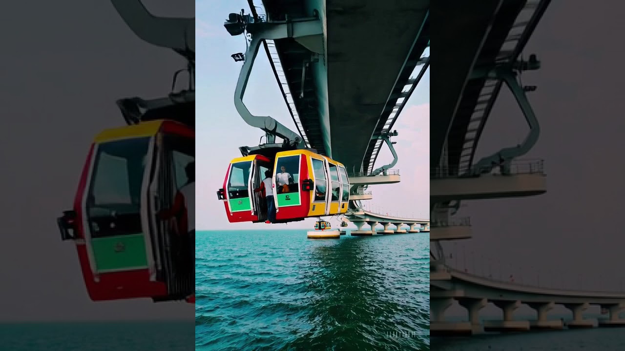 Marina beach with Rope car moving..!! Marina beach with Chennai sea link road on the sea..! 