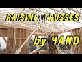 Setting 30 foot trusses by hand