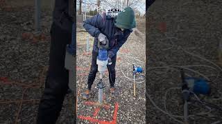 Ground screw installation.