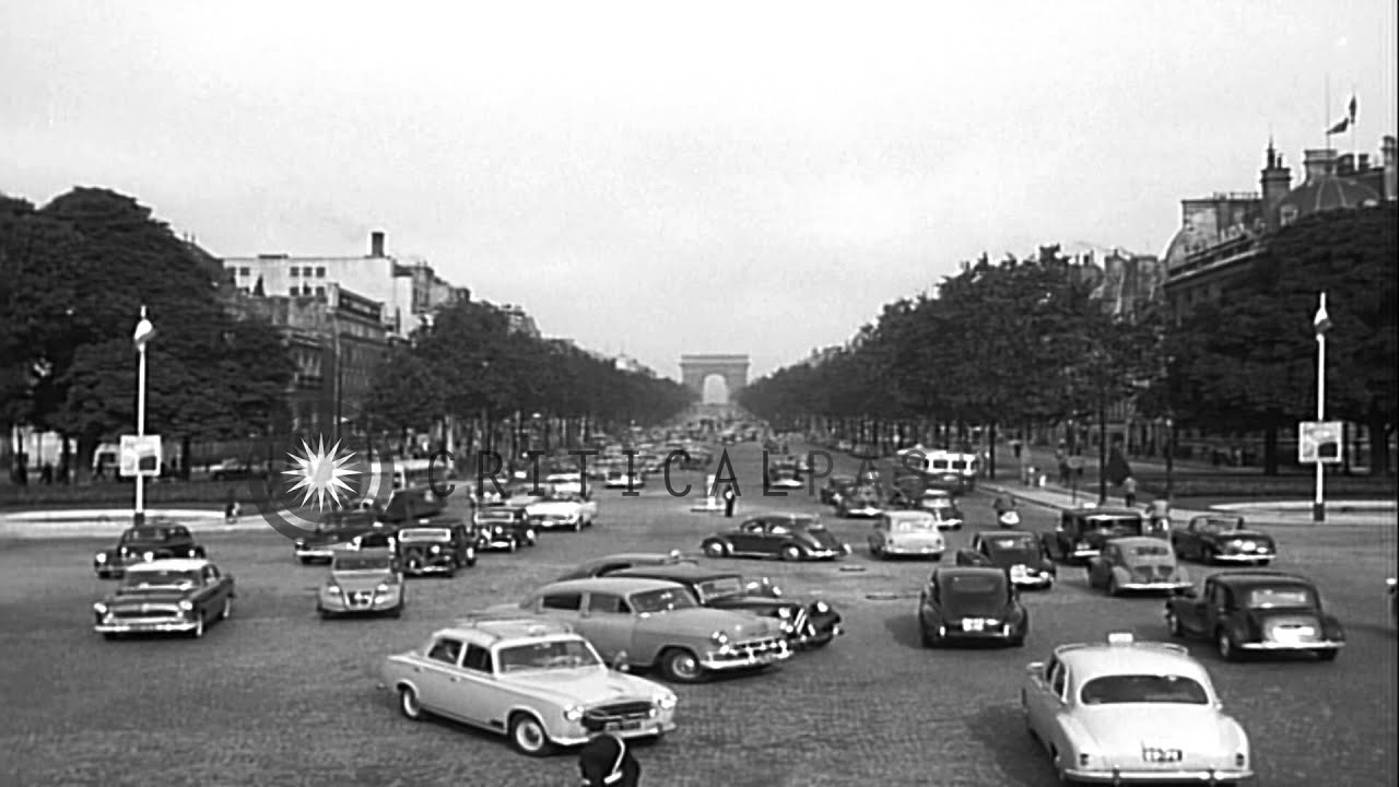 The Champs Elysees in Paris, giving a view Arc De Triumph in the background. HD Stock Footage