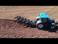 Ploughing with brand new New Holland PHVH5 5 furrow plough and New Holland T6.180