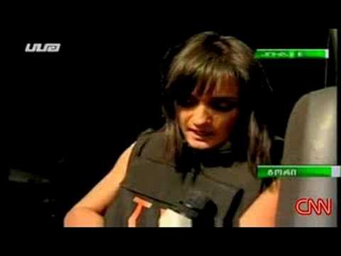 Georgian reporter Tamara Urushadze gets shot by a sniper on air while reporting on the war between Russia and Georgia, after the shooting she continue reporting with armor.