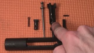 How to disassemble an AR 15 bolt carrier group