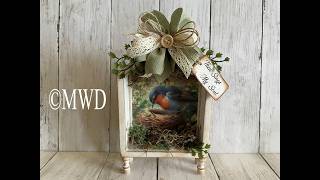Nesting bird in her birdhouse. Thrift store upcycle!