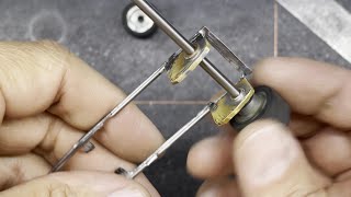 Assembling and restoring a slot stox car chassis to improve performance