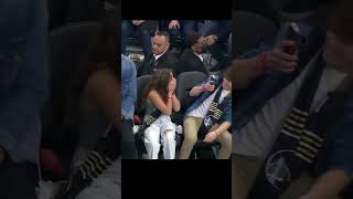 it s like a girl won the lottery with her idol Lebron James next to her short