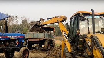 JCB Backhoe Loader Machine Loading Soil on Tractor. Jcb Backhoe Loader New Video