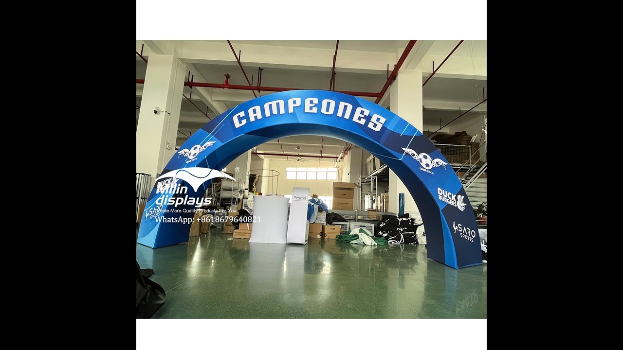 Portable tension fabric arch display