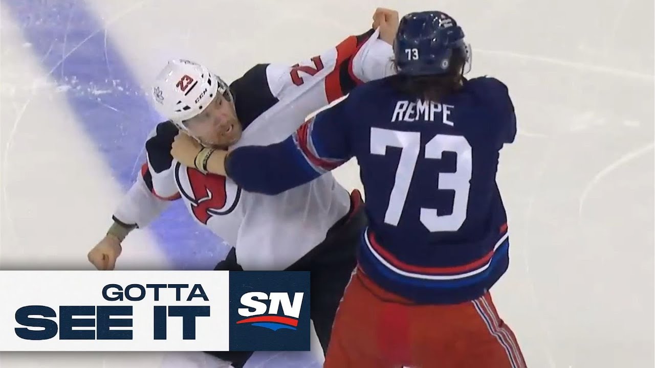 ⁣Rangers And Devils Brawl Moments After Puck Drop