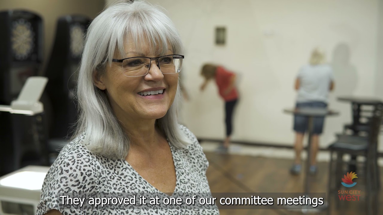 Arts and Design Special Committee help turn the Shuffleboard Room into Lizard Acres Pub