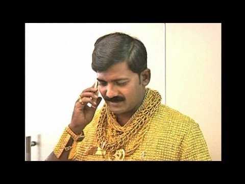 indian with gold shirt