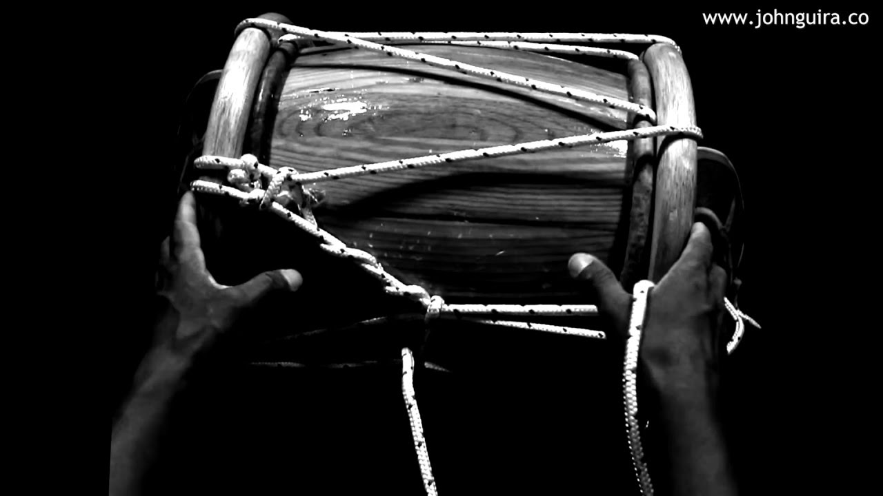 Como afinar la "Tambora Dominicana" - johnguira