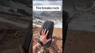 Tire Breaks Rock