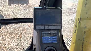 Komatsu 200 Excavator: How Do I “Turn The Hydraulic Thumb On”?