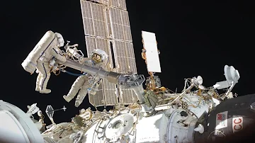 Russian cosmonauts arrive at International Space Station in colours similar to Ukrainian flag