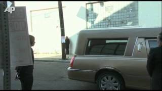Houston's Casket Arrives at Church for Funeral