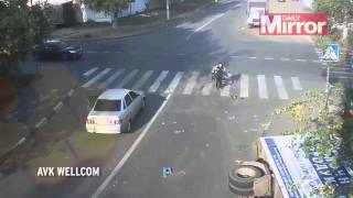 World&amp;#039;s luckiest cyclist? Rider miraculously escapes injury when he is caught in car smash