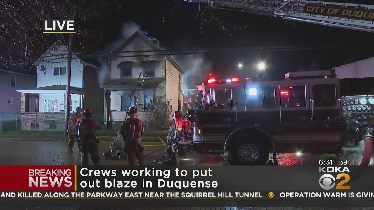 Firefighters battle house fire in Duquesne - YouTube