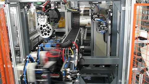 Side Entry Servo Robotic IML System by IMDECOL