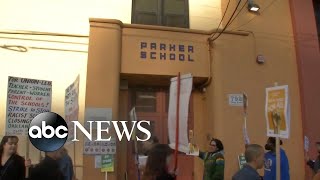 Teachers and parents protest over school closures in Oakland