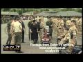 Camilla presents medals to 4 rifles using a mobility scooter