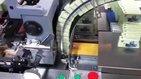 Automatic cigarette box over wrapping machine
