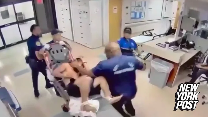 Wild video shows firefighter socking handcuffed ho...