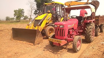 jcb backhoe loader loading red mud in mahindra and swaraj tractor trolley | jcb and tractor video