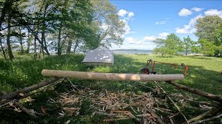 Log building (shelter) CUTTING DOWN THE SILL LOG AND DEBARKING (episode 5)