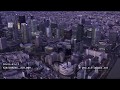 Aerial Footage by dusk / The tower Saint-Gobain in the business district of Paris La Défense