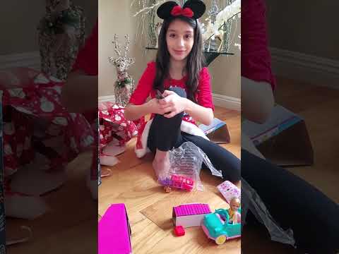 Opening Christmas gifts 🎁
