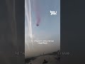  deux parachutistes en wingsuit ont vol  travers le tower bridge de londres 